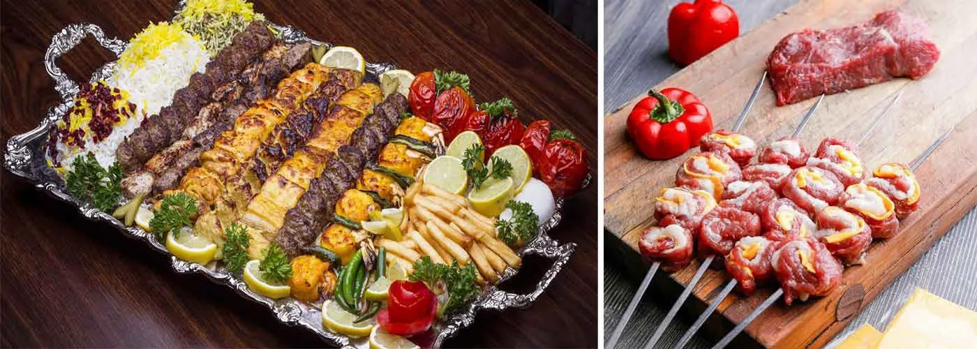 A silver platter of mixed Iranian kebabs with saffron and plain rice, grilled tomatoes, peppers and lemon, beside raw koobideh kebab skewers on a board